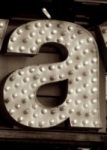 The Letter a_3 - Accent - Sepia Tone